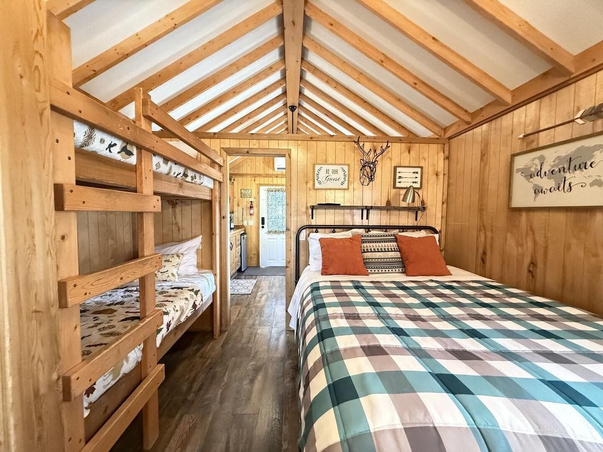 Along with the queen are two small bunkbeds for your little ones.
