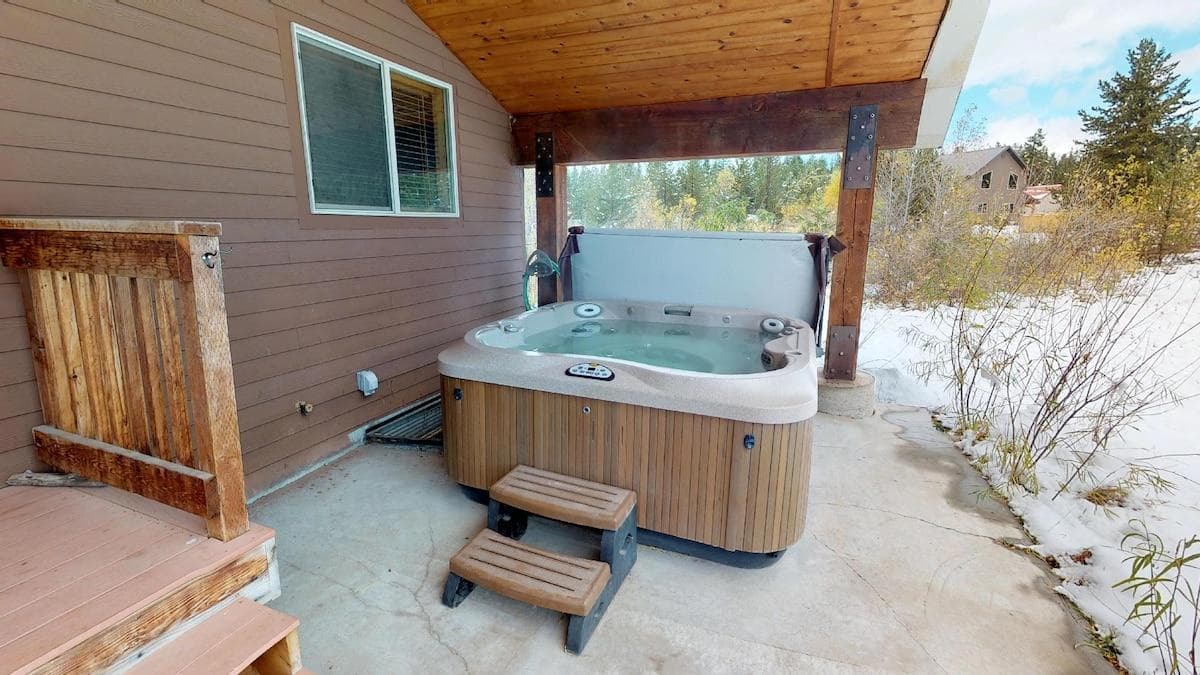 Relax in the hot tub during your stay.